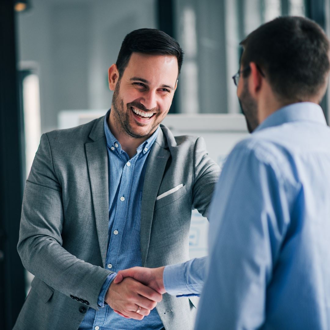 two men shaking hands